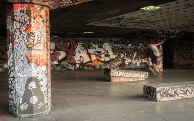 BMX and Skateboard Park. An inner city urban concrete area adorned with graffiti and regenerated...