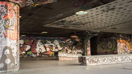 BMX and Skateboard Park. An inner city urban concrete area adorned with graffiti and regenerated into a skateboarding and BMX park.