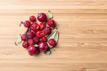 Little heap of the cowberries with leaves