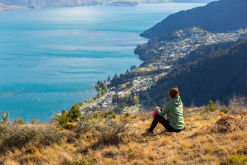 Woman enjoys views of Queenstown