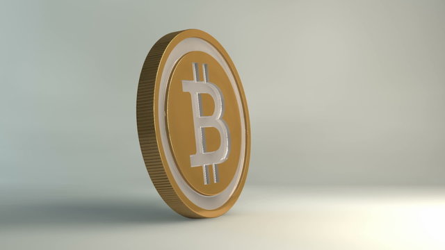 A literal depiction of a bit coin spinning on a studion background