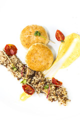 chicken cutlet with quinoa porridge on a table in a restaurant