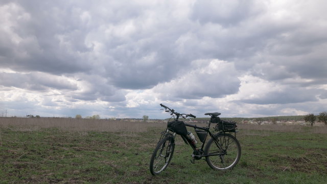 Bicycle and field with  sky. 4K (4096x2304)   Time lapse without bird
