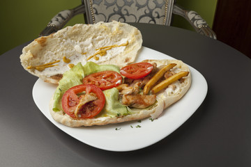 sandwich on white plate