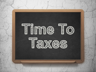 Finance concept: Time To Taxes on chalkboard background