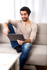 Young man using a tablet pc