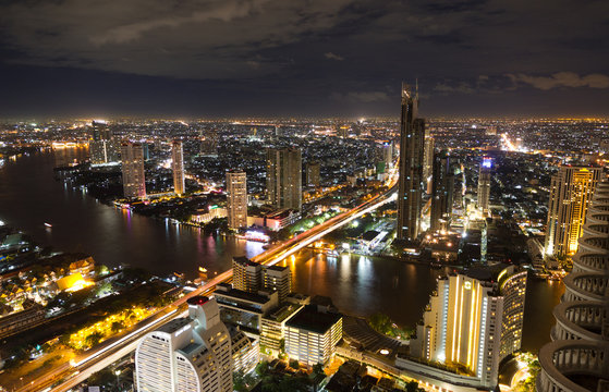 Cityscape of the Bangkok skyline at night in Thailand