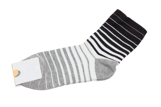 New socks with lable isolated on white.