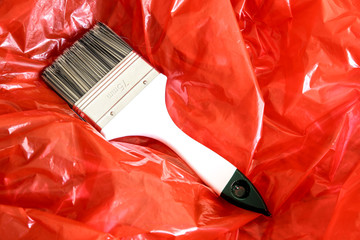 Paint Brush on red Foil.
