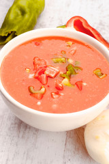 Andalusian gazpacho in white porcelain bowl