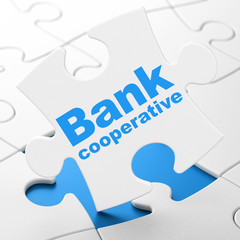 Money concept: Bank Cooperative on puzzle background