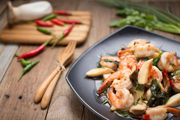 Stir Fried shrimp with Holy Basil on the black dish
