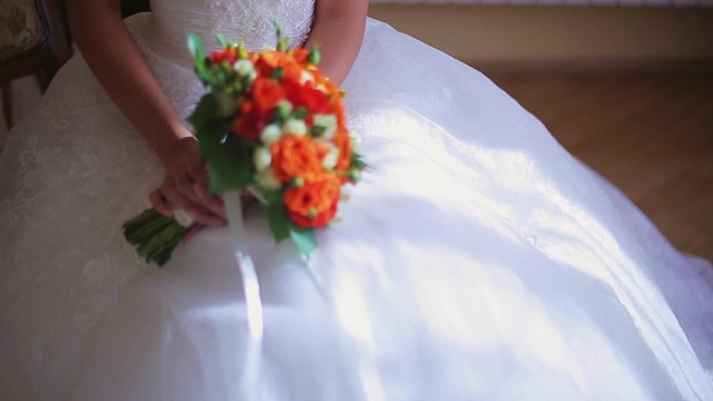 the bride holds a wedding bouquet of flowers 1