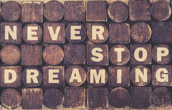 Never Stop Dreaming message. Cross processed image for vintage look