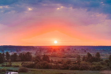 Obraz premium Beautiful Forest On Sunrise. Dramatic Sky With Sunset Sun Over S