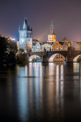 Fototapeta premium Night view of illuminated Charles Bridge in Prague, Czech Republ