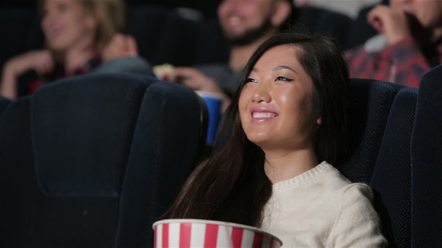 Girl shows emotions during of a melodrama
