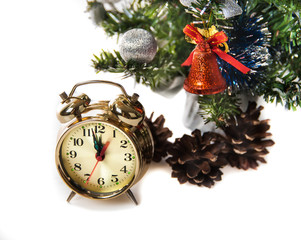Fototapeta na wymiar clock,bumps on the background of a decorated Christmas tree in t