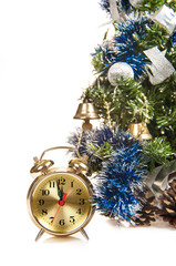 Fototapeta na wymiar round-the-clock on the background of a decorated Christmas tree