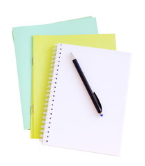 School office subjects bright notebooks an empty notebook on a white background the isolated. School office  the isolated