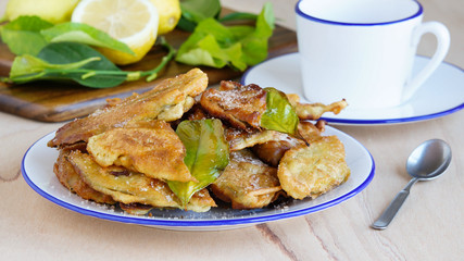 Paparajotes - typical dessert of Murcia, made of lemon leaves covered with dough, sprinkled with powdered sugar and cinnamon