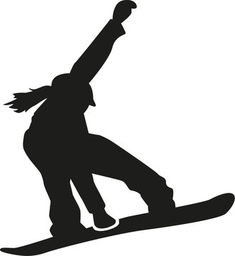 Female snowboarder jumping