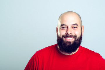 young bearded man in red shirt