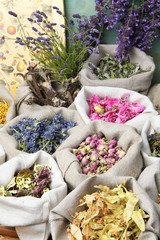 Healing medical herbs in a linen sacks.
