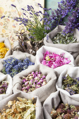 Healing medical herbs in a linen sacks.