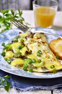 Omelet stuffed with brussels sprout,mushroom and cheese.
