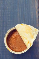fish pate on blue wooden background