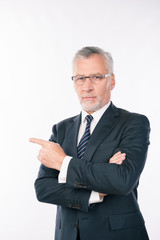 confident intelligent  business expert with gray beard and glass