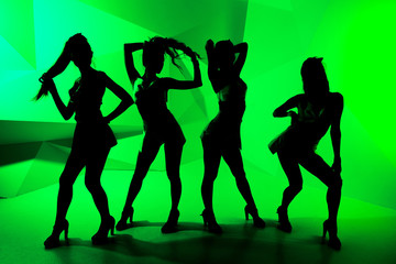 Fototapeta na wymiar silhouettes of dancing girls
