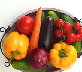 Fresh autumn vegetables on a white background