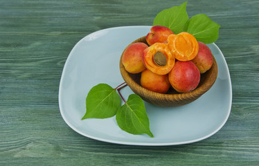 Fresh apricots in plate