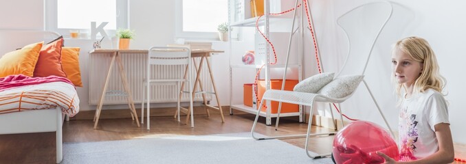 Teenage girl on floor