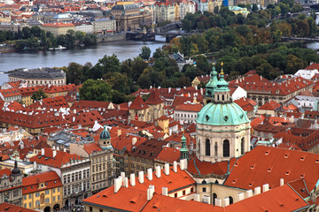 Naklejka na ściany i meble Panorama of Prague Old Town with red roofs and Vltava river
