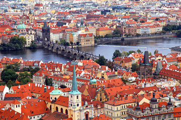 Naklejka na ściany i meble Panorama of Prague Old Town with red roofs and Vltava river