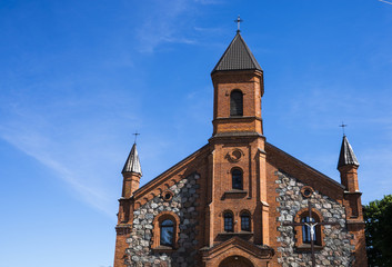 Fototapeta na wymiar Catholic church in Belarus against blu sky