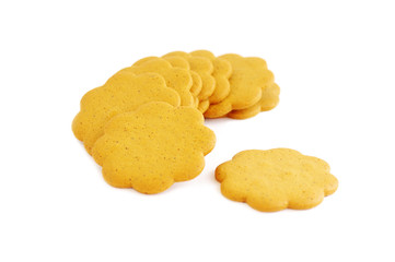 Figured yellow cookies on a white background the isolated. The figured cookies isolated