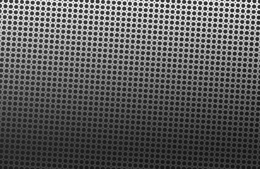 Metal background abstract with back holes.