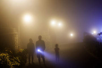 Lighting torch through mist