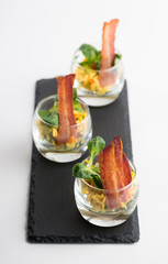 Speckship mit Reissalat als Vorspeise