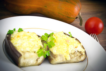 Stuffed eggplant and fresh Tomatoes.