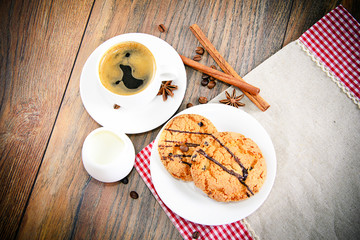 Coffee with Bakery on Woody Retro Background.