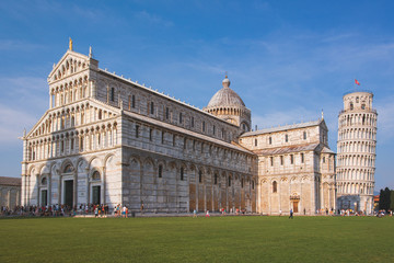 Fototapeta na wymiar Cathedral of Pisa with the leaning tower, famous tourist destination