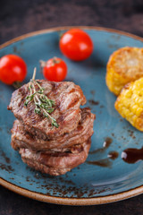 Pieces of red meat, steaks with vegetable and spices.selective focus