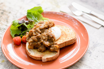 Beef in curry and benedict egg sanwich