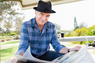 Fototapeta premium Enjoying reading of newspaper
