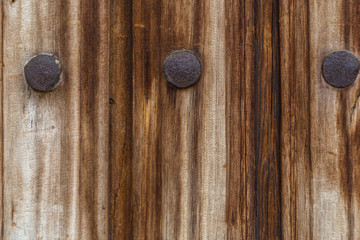 Old planks and iron nails background